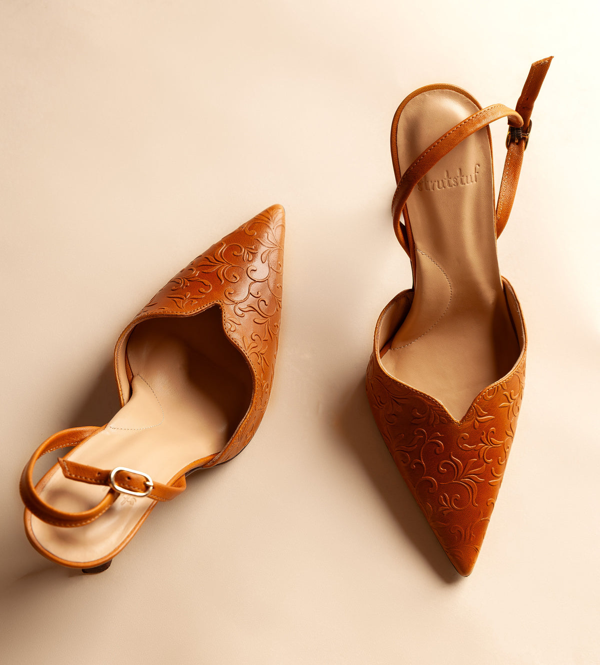 Cabriole Embossed Leather